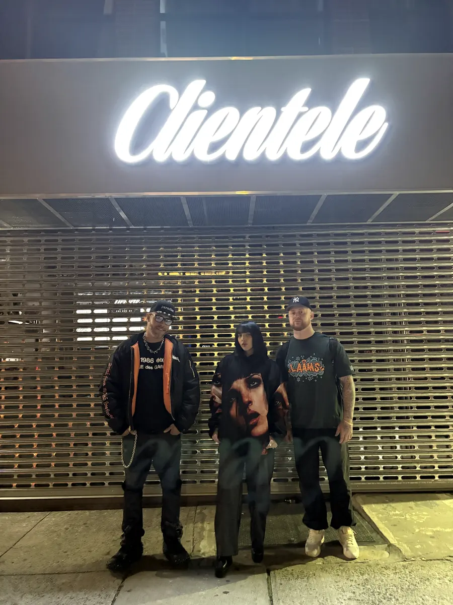 The requiem for youth. crew outside Clientele at night
